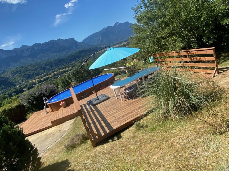 construction d’une terrasse en bois de  PiN traité classe 4 avec plusieurs niveaux sur un terrain en pente à  Saint-christophe la grotte en Savoie 
